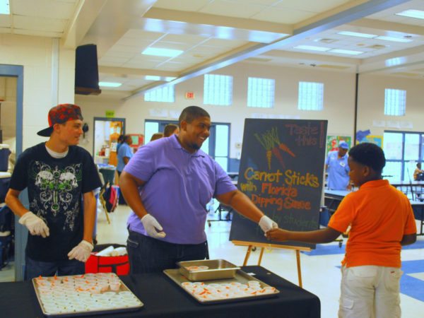 Matt and Arthur serve carrots sticks with Florida Dip.